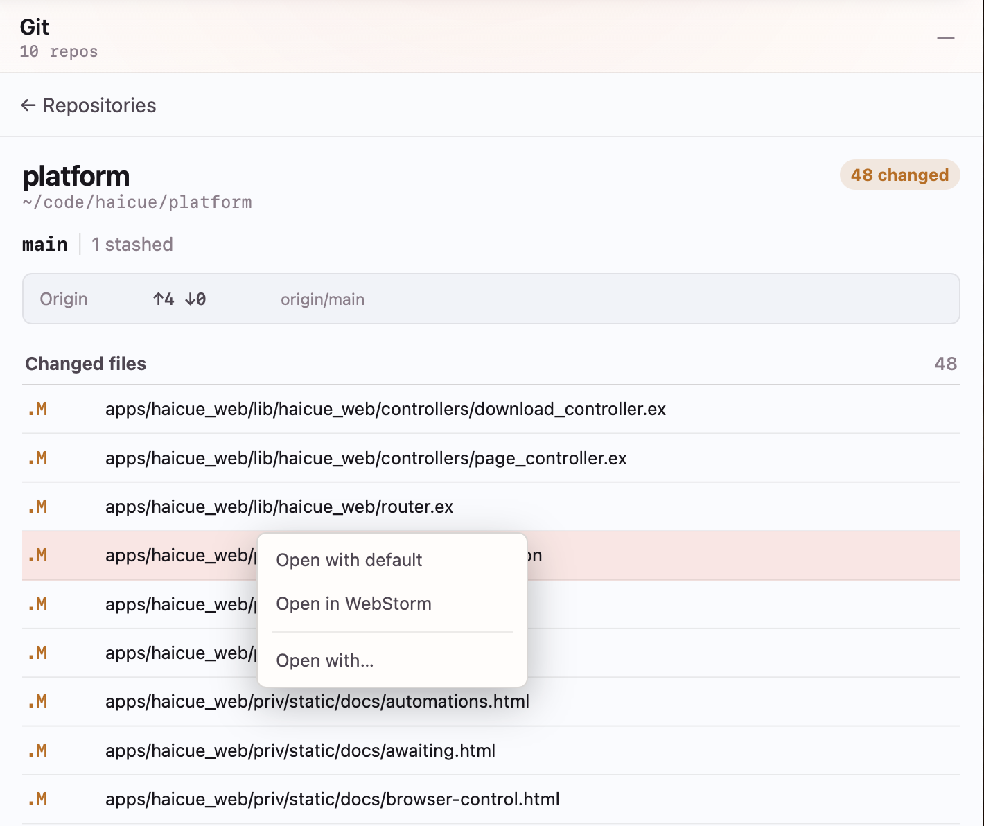 Git repository detail showing the platform branch, changed files, and a file menu with options to open in the default app, WebStorm, or another application.